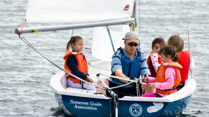 Brownies learn to sail in Somerspirit dinghy