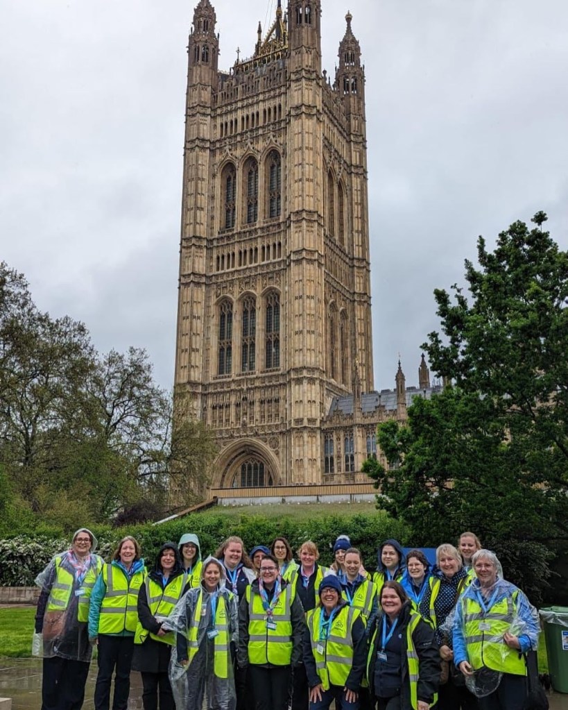 Girlguiding volunteers outside Lambeth Palace