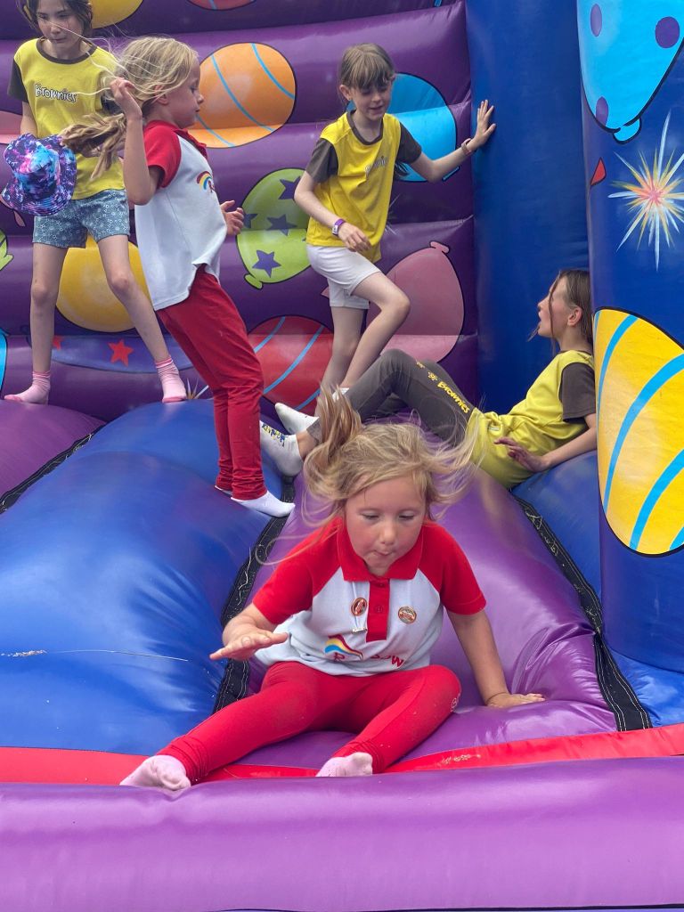 Photo Rainbows and Brownies on a bouncy castle