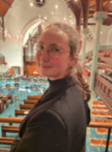 Photo of Saba overlooking a venue set up for the orchestra